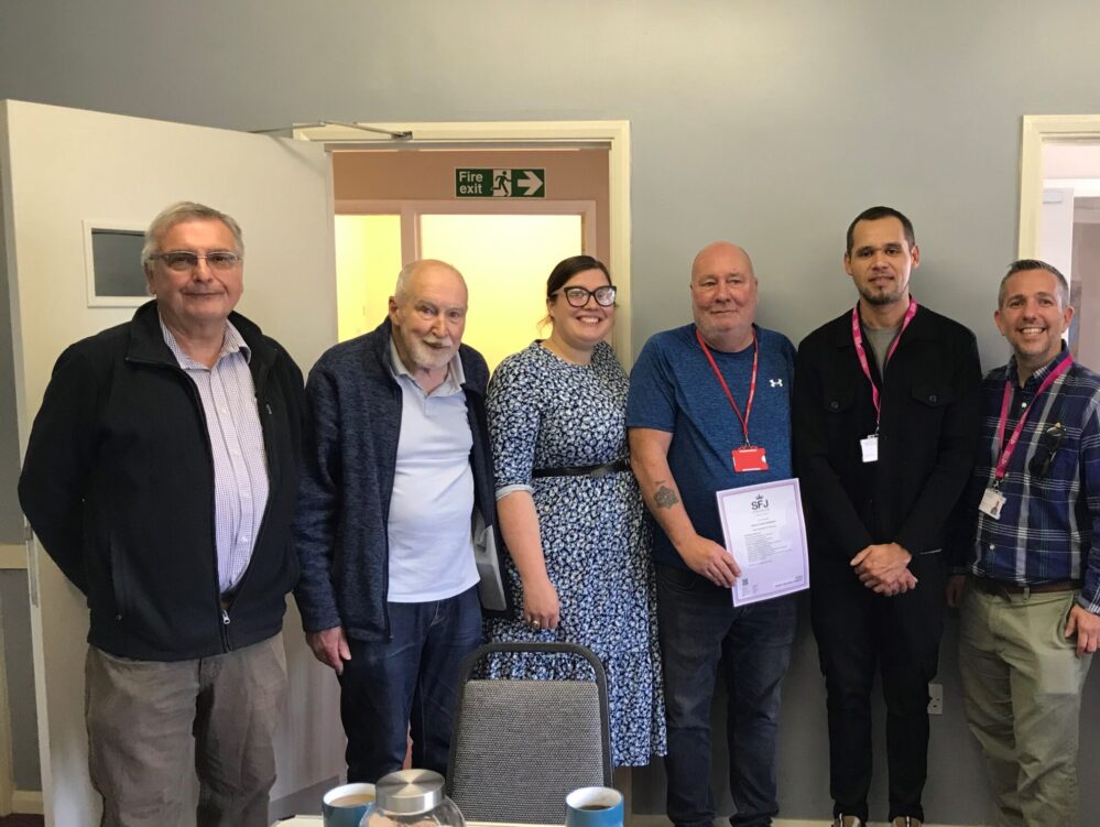 An image of GPA Presenting Kevin with his National Volunteering Certificate